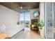 Bright bedroom featuring large windows with cityscape view, white walls, and modern decor at 210 N Church St # 2807, Charlotte, NC 28202