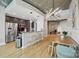 Modern kitchen and dining area featuring stainless steel appliances, countertops, and stylish seating at 210 N Church St # 2807, Charlotte, NC 28202