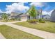 Charming single-Gathering home with a well-maintained lawn and a two-car garage in a suburban neighborhood at 215 Pintail Dr, Monroe, NC 28110