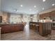 Open-concept living area with hardwood floors and a view of the kitchen at 215 Pintail Dr, Monroe, NC 28110