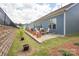 Inviting patio area with outdoor seating, perfect for relaxation and entertaining at 215 Pintail Dr, Monroe, NC 28110