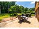 Cozy patio with outdoor table and chairs, offering a relaxing outdoor space at 2209 Cardinal Loop, Stanley, NC 28164