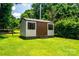 Well-maintained storage shed with a double-door entrance in a large backyard at 2209 Cardinal Loop, Stanley, NC 28164