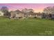Expansive backyard with lush green lawn, perfect for outdoor activities and entertaining at 2316 Woodfield Cir, Gastonia, NC 28056
