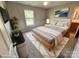 Cozy bedroom with neutral tones, soft lighting, and a stylish accent rug at 2316 Woodfield Cir, Gastonia, NC 28056