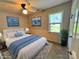 Comfortable bedroom featuring a plush bed and scenic artwork on the walls at 2316 Woodfield Cir, Gastonia, NC 28056