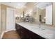 Double vanity bathroom with white countertops, dark cabinetry, and neutral wall colors at 2354 Valelake Rd, York, SC 29745