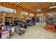 Spacious garage with exposed beam ceiling used for vehicle and general storage at 2354 Valelake Rd, York, SC 29745
