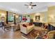 Inviting living room with neutral sofas, patterned rugs, and decoratively adorned walls at 2354 Valelake Rd, York, SC 29745