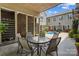 Inviting patio area featuring a round table set and a shared pool, perfect for outdoor entertaining at 2354 Valelake Rd, York, SC 29745