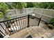 Private courtyard patio with brick flooring, lattice fencing and cozy outdoor seating at 2354 Valelake Rd, York, SC 29745