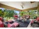 Stunning covered porch with comfortable seating and scenic lake views offering a relaxing outdoor space at 2354 Valelake Rd, York, SC 29745