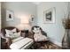 Charming sitting area with comfortable wicker chairs, patterned cushions, and soft lighting at 2354 Valelake Rd, York, SC 29745