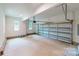 Spacious garage with a large door, ample lighting, and plenty of room for vehicles and storage at 248 Pioneer Dr, Mount Gilead, NC 27306