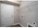 Functional laundry room includes shelving and washer/dryer hookups at 248 Pioneer Dr, Mount Gilead, NC 27306