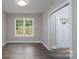 Open entryway with wood-look flooring and a view from the front door at 248 Pioneer Dr, Mount Gilead, NC 27306