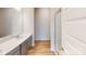The bathroom features gray cabinets, a shower with glass doors, and hard surface floors at 2547 Ruby Dixon Crossing Dr # 17, Gastonia, NC 28056
