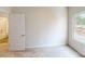 Neutral bedroom with carpet and view into bathroom at 2547 Ruby Dixon Crossing Dr # 17, Gastonia, NC 28056