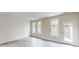 The living area features wood floors, multiple windows, and a back door to the outside at 2547 Ruby Dixon Crossing Dr # 17, Gastonia, NC 28056