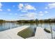 A picturesque dock with lake views, surrounded by trees and a clear blue sky at 25566 Seagull Dr, Lancaster, SC 29720