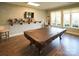 Game room with large pool table, a wall-mounted TV, and bright windows at 25566 Seagull Dr, Lancaster, SC 29720