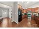 Well-equipped kitchen with stainless steel appliances, wood floors, and ample cabinet space at 25566 Seagull Dr, Lancaster, SC 29720