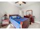 Bedroom featuring a wood framed bed with blue bedding, a dresser and neutral colors at 25566 Seagull Dr, Lancaster, SC 29720