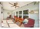 Covered patio with lake views and ample seating at 25566 Seagull Dr, Lancaster, SC 29720