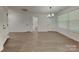 Spacious living room featuring wood flooring and natural light at 2620 Poplar Cove Nw Dr, Concord, NC 28027