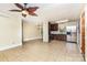 Open-concept layout with tile flooring seamlessly connects kitchen and living spaces at 2631 Ivey Church Rd, Lincolnton, NC 28092