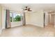 Spacious room features tiled floors, large windows, and a ceiling fan at 2631 Ivey Church Rd, Lincolnton, NC 28092