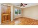 Bright room features hardwood floors, a large window, and a ceiling fan at 2631 Ivey Church Rd, Lincolnton, NC 28092