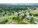 Neighborhood aerial view shows a home with lush trees and manicured green lawns at 2779 Touchstone Cir, Newton, NC 28658
