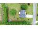 Aerial view of property showcasing expansive green space, mature trees, and manicured landscaping at 2779 Touchstone Cir, Newton, NC 28658