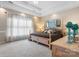 Spacious bedroom with a king-sized bed and natural light from a large window at 2779 Touchstone Cir, Newton, NC 28658