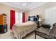 Comfortable bedroom featuring neutral walls, a ceiling fan, and functional furniture for a cozy space at 2779 Touchstone Cir, Newton, NC 28658