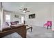 Spacious living room with a fireplace, comfortable seating, and a mounted television at 3725 Leela Palace Way, Fort Mill, SC 29708