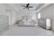 Spacious main bedroom with trey ceiling, ceiling fan, carpet floors, and large windows for ample natural light at 3725 Leela Palace Way, Fort Mill, SC 29708