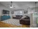 Bright living room with hardwood floors, vaulted ceiling, and a comfortable seating area with a large window at 4059 Caitlins Way, Hickory, NC 28602