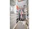 Organized walk-in closet features built-in shelving and drawers, plus hanging storage and a patterned rug at 4059 Caitlins Way, Hickory, NC 28602