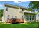 Large backyard with a wooden deck and grill, perfect for outdoor gatherings and relaxation at 415 Glandon Ct, Fort Mill, SC 29708
