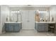 Elegant bathroom featuring dual vanities, stylish lighting, and tile flooring at 415 Glandon Ct, Fort Mill, SC 29708