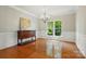 Formal dining room with hardwood floors and ample natural light at 415 Glandon Ct, Fort Mill, SC 29708