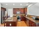 Spacious kitchen with granite countertops, stainless steel appliances, and tile backsplash at 415 Glandon Ct, Fort Mill, SC 29708