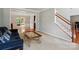 Spacious living room leading to the dining room with staircase at 415 Glandon Ct, Fort Mill, SC 29708
