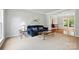 Cozy living room with a blue sofa and neutral carpet at 415 Glandon Ct, Fort Mill, SC 29708