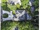 Aerial view of a stunning property with a private pool and lush green surroundings at 4211 Tangle Dr, Charlotte, NC 28211