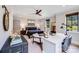 A bedroom with a ceiling fan, desk, and bright natural light at 4211 Tangle Dr, Charlotte, NC 28211