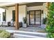 Charming front porch with modern seating and stylish decor elements at 4211 Tangle Dr, Charlotte, NC 28211