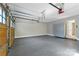 Spacious garage with epoxy flooring and ample storage space at 4211 Tangle Dr, Charlotte, NC 28211